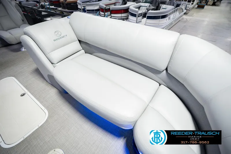 Slide: The Image of Luxurious seating on a 2017 Bennington 220 LE3 pontoon boat, featuring white upholstery. - 44