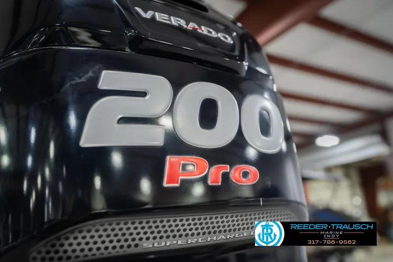 Slide: The Image of Close-up of a 2017 Bennington 220 LE3 Verado 200 Pro outboard motor. - 52