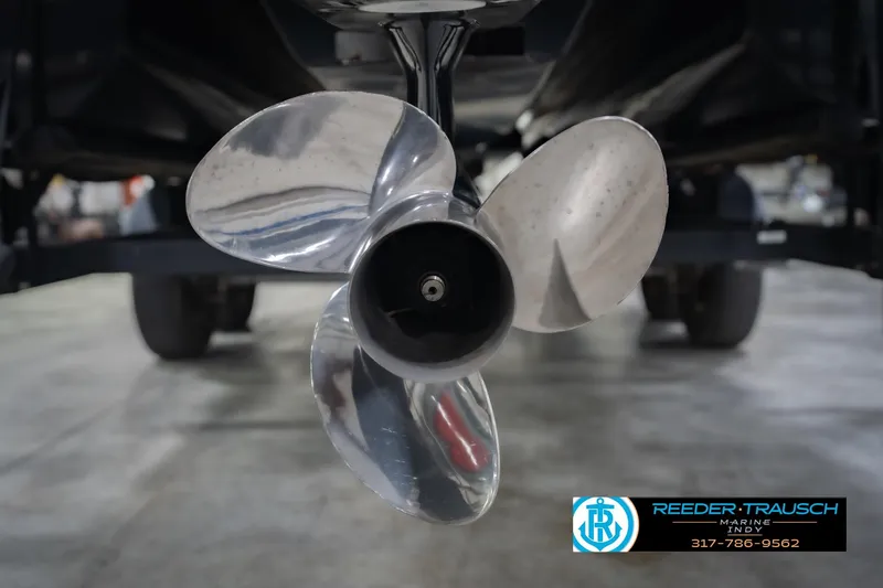 Slide: The Image of Close-up of a 2017 Bennington 220 LE3 boat propeller in a showroom. - 53