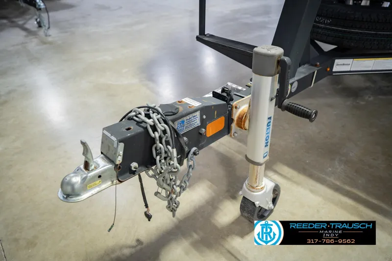 Slide: The Image of Trailer hitch and jack of a 2017 Bennington 220 LE3 boat. - 55