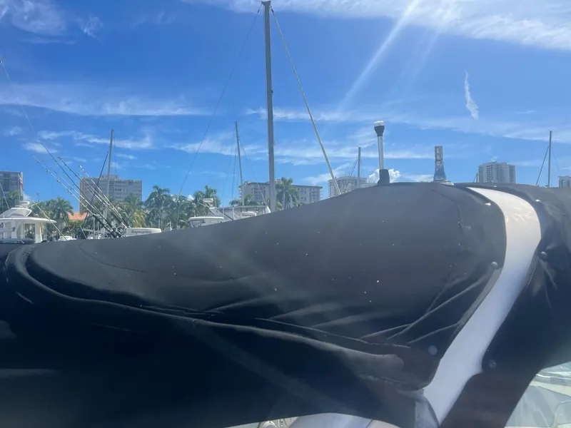 Slide: The Image of Sea Ray Sundancer 280 boat covered at marina, 2011 model. - 11