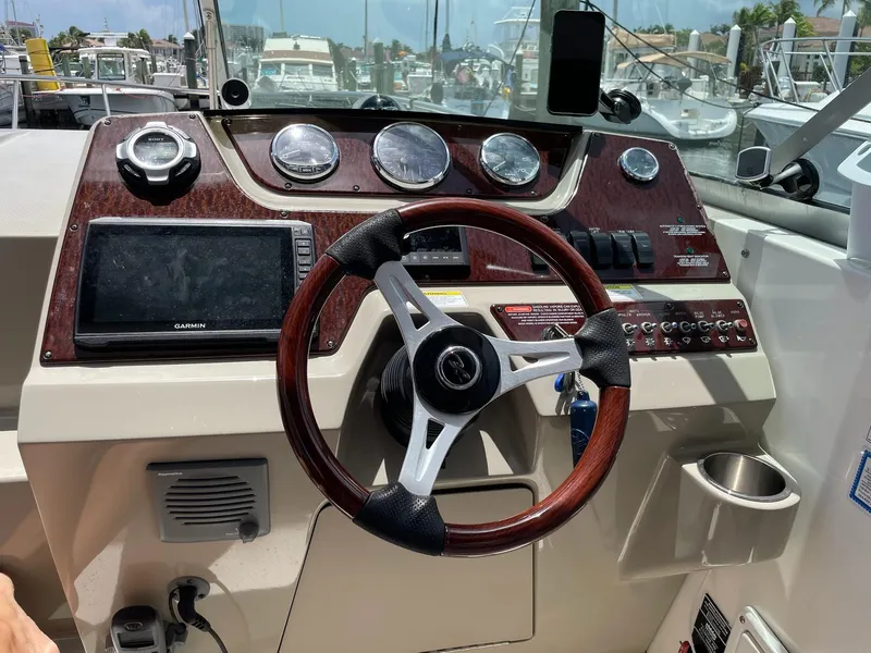 Slide: The Image of Sea Ray Sundancer 280 helm, 2011 model dashboard. - 20