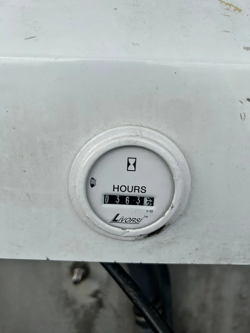 Slide: The Image of Hour meter on Baja 30 Outlaw boat, displaying 363 hours. - 18