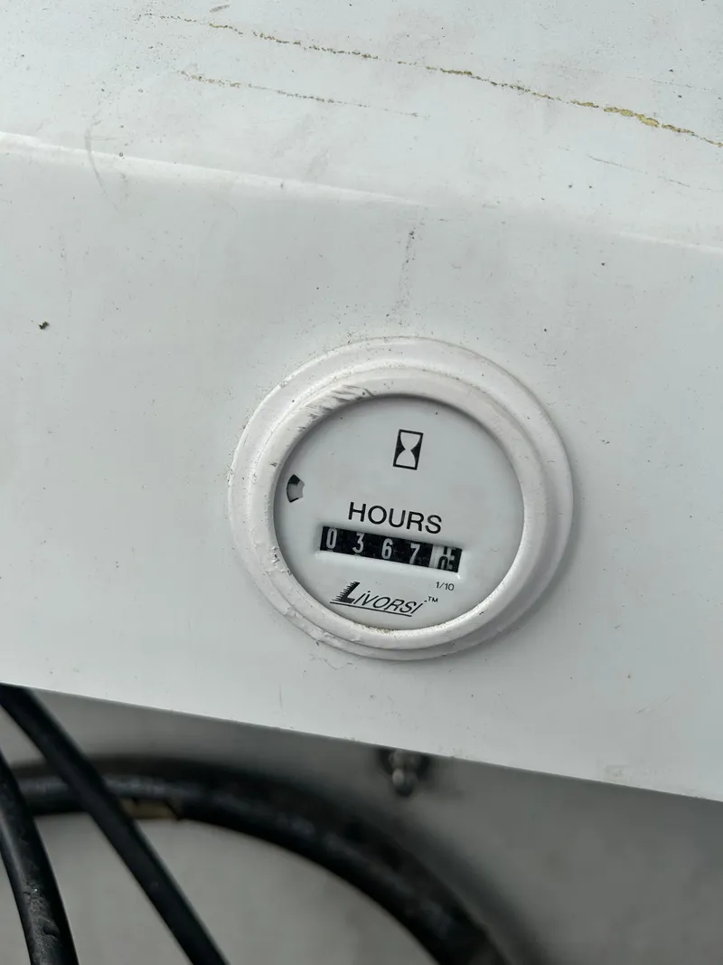 Slide: The Image of Hour meter on Baja 30 Outlaw boat, displaying 367 hours. - 19