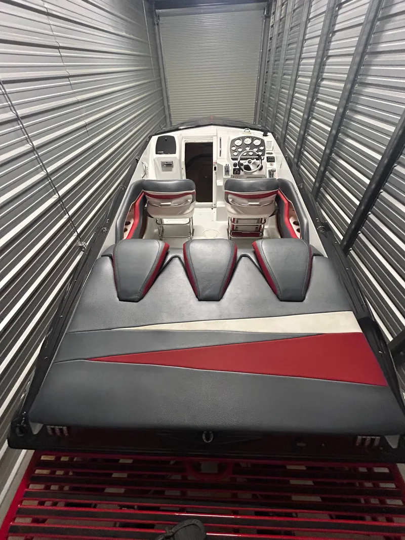 Slide: The Image of 2006 Baja 30 Outlaw boat in storage unit, interior view. - 21