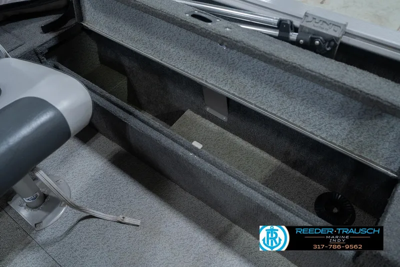 Slide: The Image of Interior view of a 2013 Lund 1650 Rebel XL Sport boat storage compartment. - 25