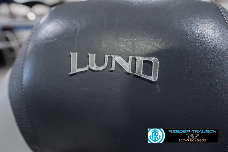 Slide: The Image of Close-up of Lund 1650 Rebel XL Sport 2013 boat seat with logo. - 33