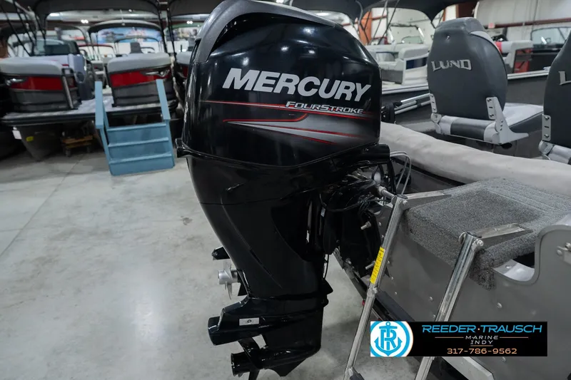 Slide: The Image of 2013 Lund 1650 Rebel XL Sport with Mercury FourStroke engine in showroom. - 37