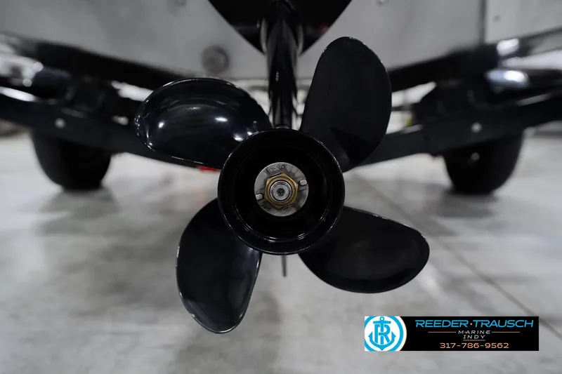 Slide: The Image of Close-up of a 2013 Lund 1650 Rebel XL Sport boat propeller in a showroom. - 40
