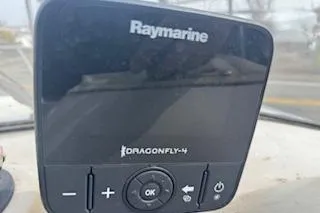 Slide: The Image of Raymarine Dragonfly-4 display on 2001 Maxum 2400 SCR boat dashboard. - 4