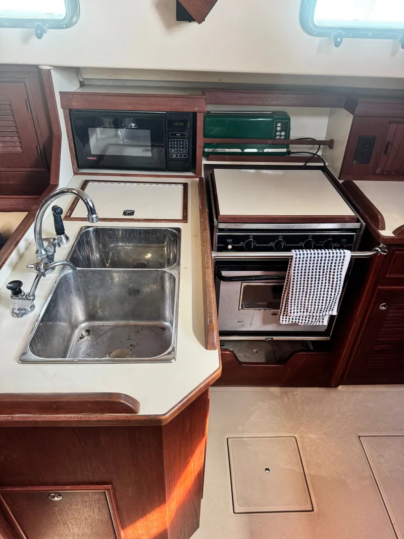 Slide: The Image of Galley area of a 2001 Island Packet 380 yacht. - 28