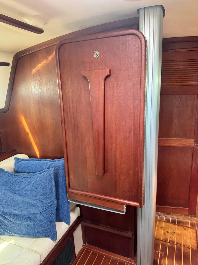 Slide: The Image of Interior of a 2001 Island Packet 380 yacht with wooden furnishings. - 32