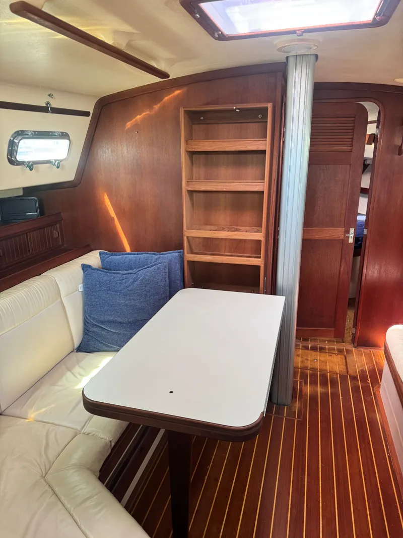 Slide: The Image of Interior of a 2001 Island Packet 380 yacht with wooden furnishings. - 33