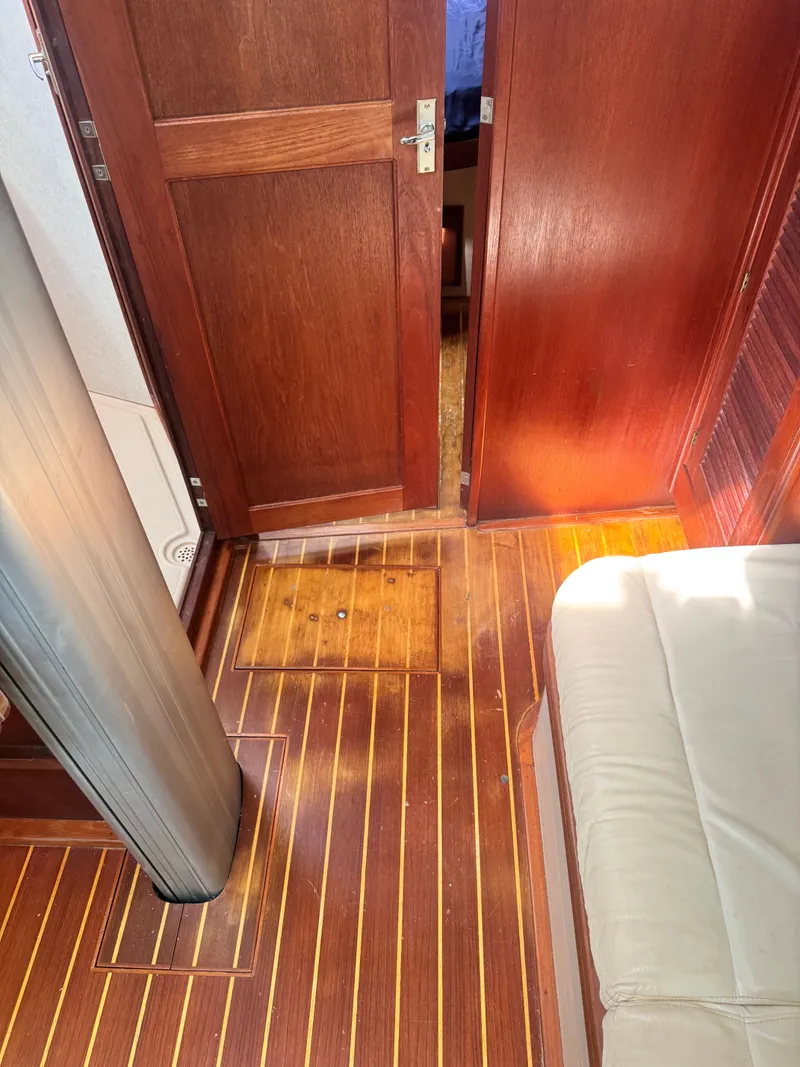 Slide: The Image of Interior of a 2001 Island Packet 380 yacht with wooden flooring. - 38