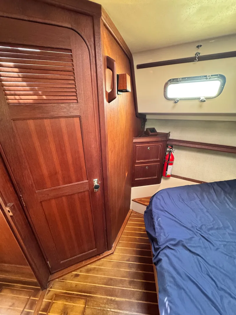 Slide: The Image of Interior of 2001 Island Packet 380 yacht with wooden furnishings. - 44