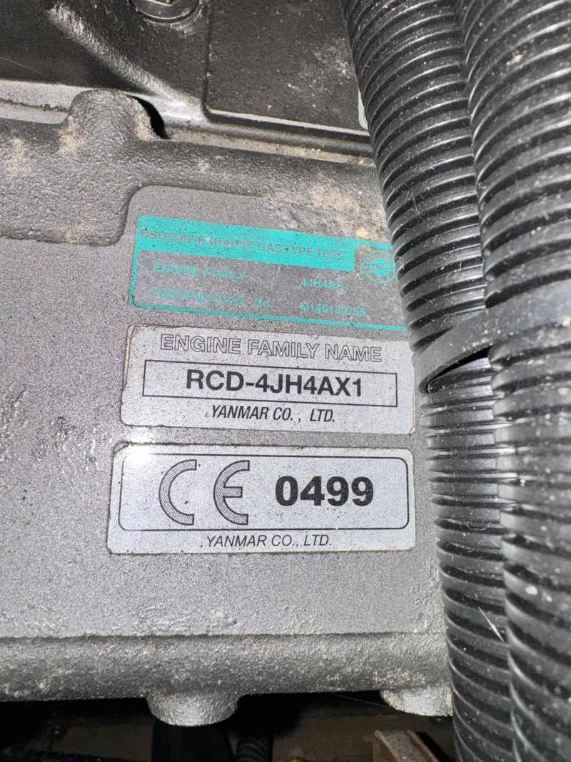 Slide: The Image of Yanmar engine plate on Island Packet 380, year 2001. - 48