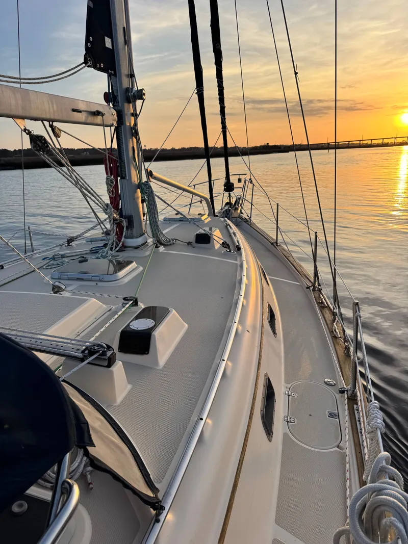Slide: The Image of Island Packet 380 sailboat at sunset, year 2001. - 9