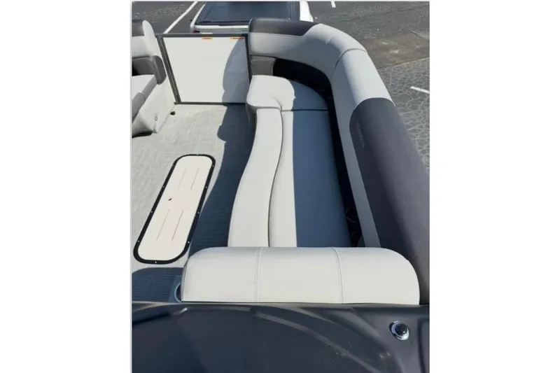 Slide: The Image of Interior seating of 2025 Veranda Relax VR25VLC pontoon boat, featuring sleek, modern design. - 11