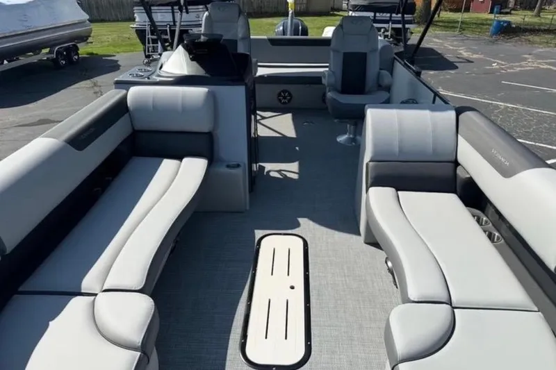 Slide: The Image of 2025 Veranda Relax VR25VLC pontoon boat interior with spacious seating and modern design. - 14