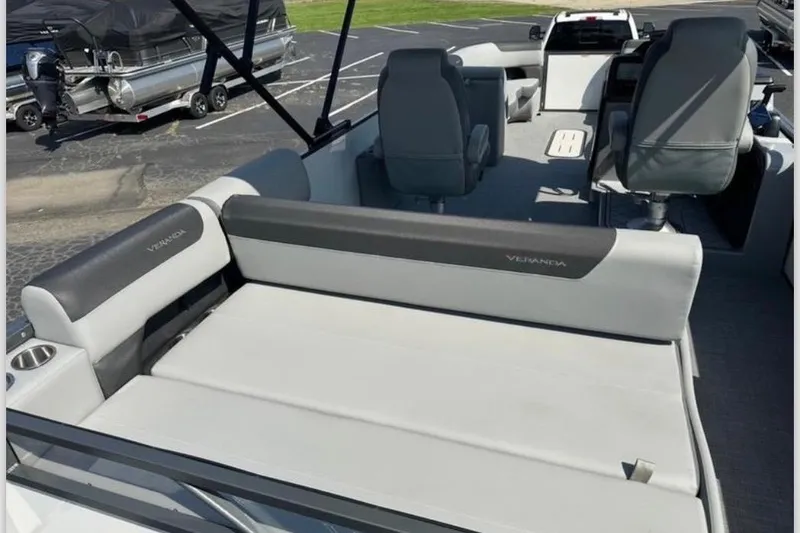 Slide: The Image of 2025 Veranda Relax VR25VLC pontoon boat interior with plush seating and modern design. - 19