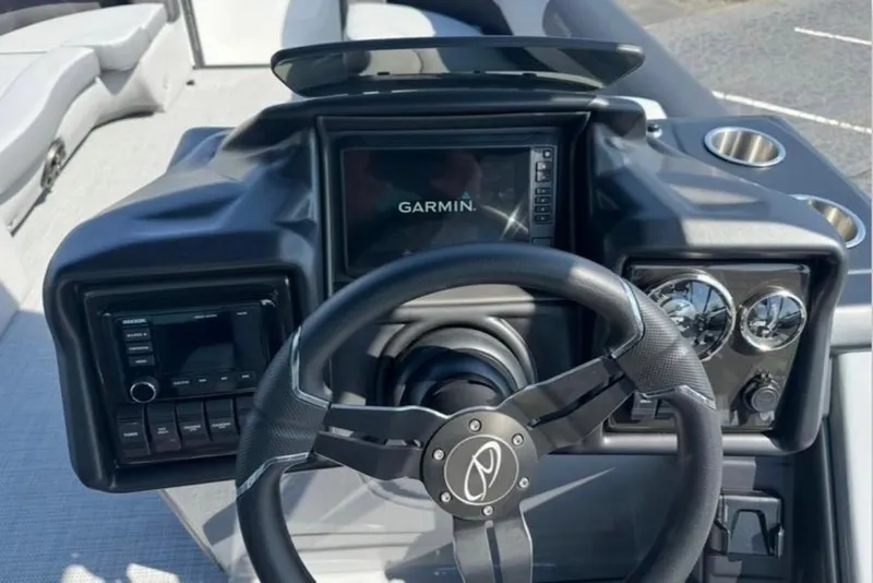Slide: The Image of Steering console of 2025 Veranda Relax VR25VLC with Garmin display and controls. - 20