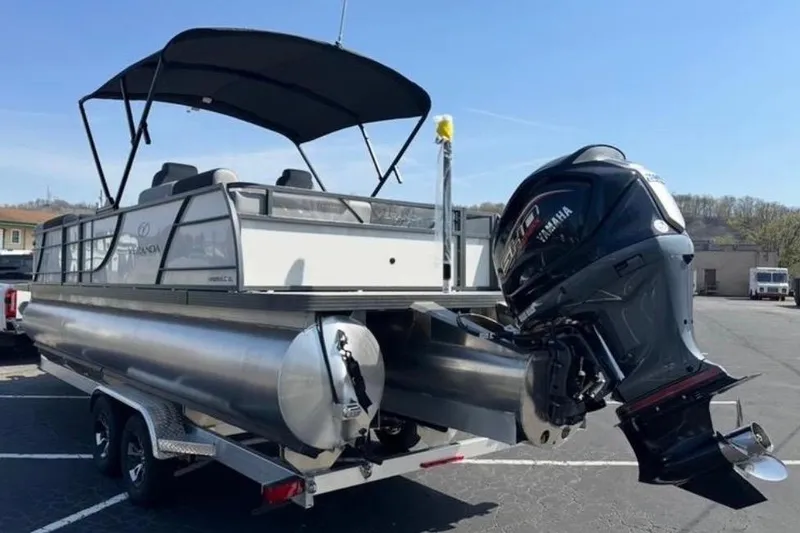 Slide: The Image of 2025 Veranda Relax VR25VLC pontoon boat with Yamaha outboard motor on trailer. - 6