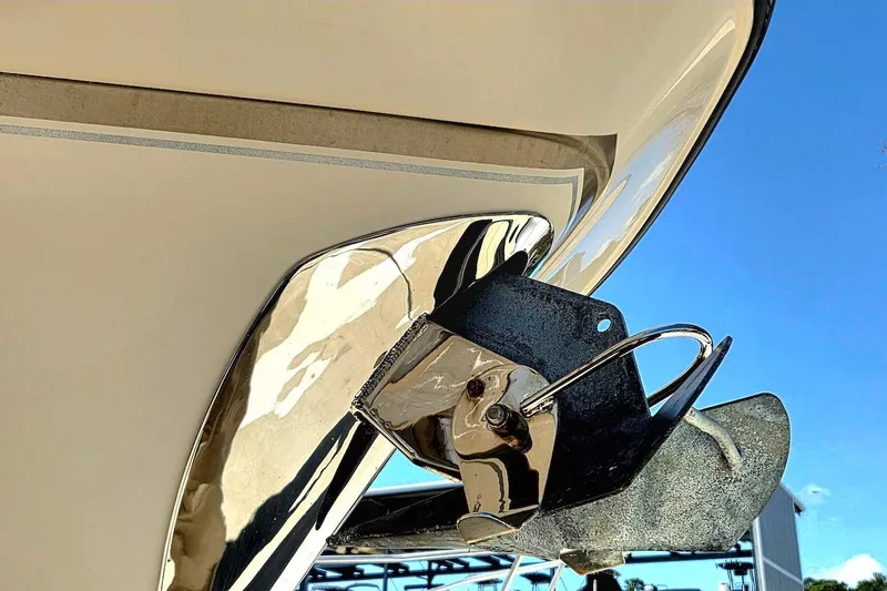 Slide: The Image of Close-up of 2015 Grady-White Freedom 307 boat anchor against blue sky. - 14