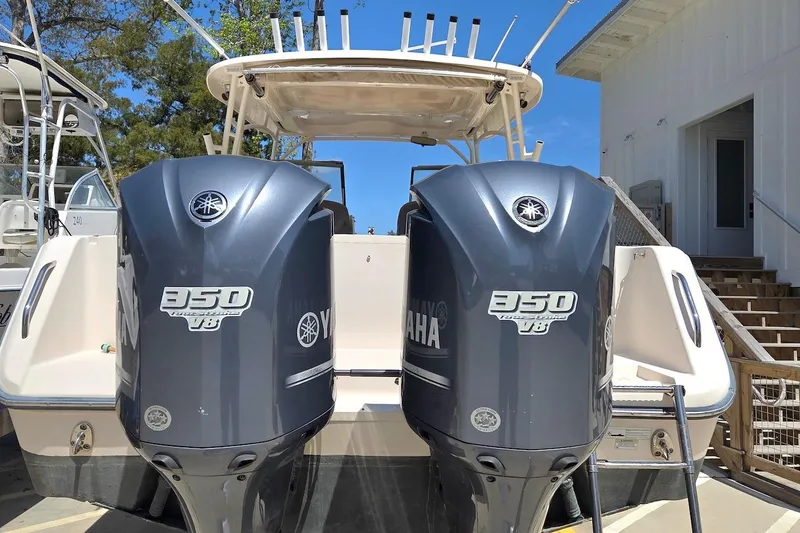 Slide: The Image of 2015 Grady-White Freedom 307 boat with twin Yamaha 350 V8 engines. - 17