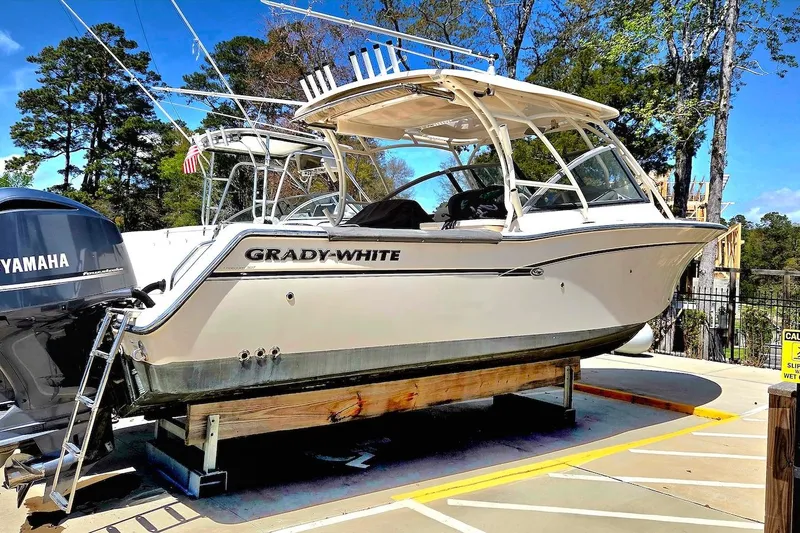 Slide: The Image of 2015 Grady-White Freedom 307 boat on display with Yamaha engine. - 2