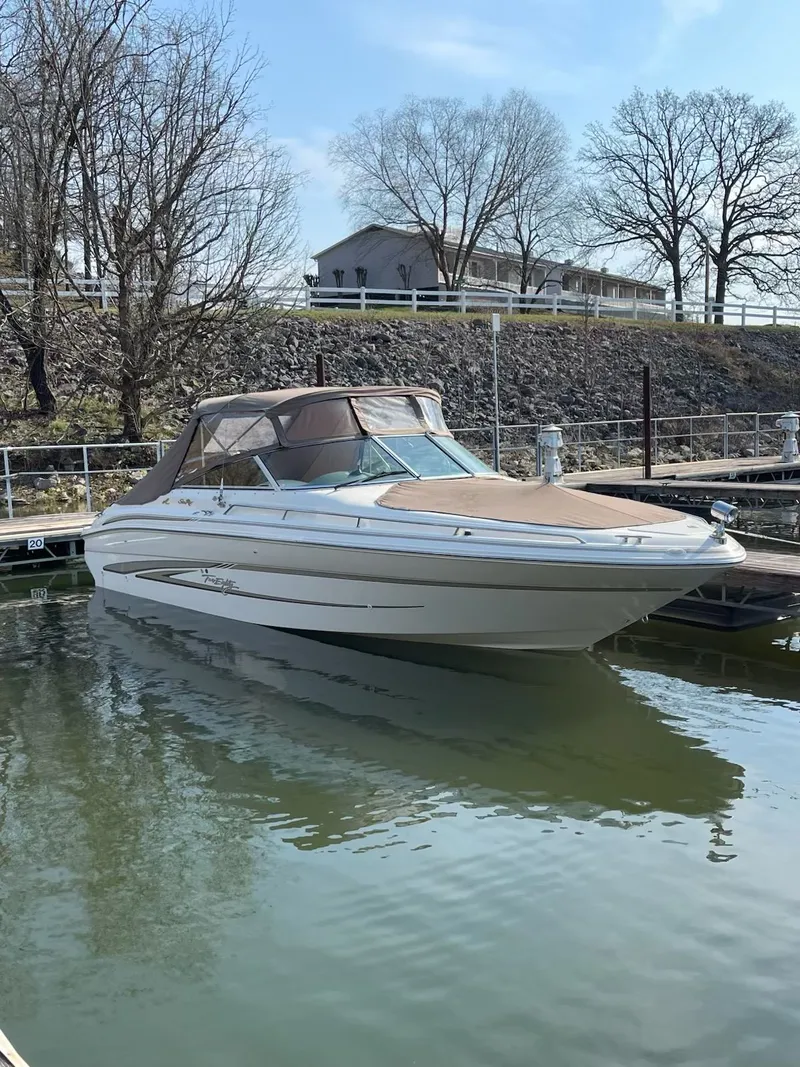 Slide: The Image of 1998 Sea Ray 280 Bow Rider boat docked at marina. - 10