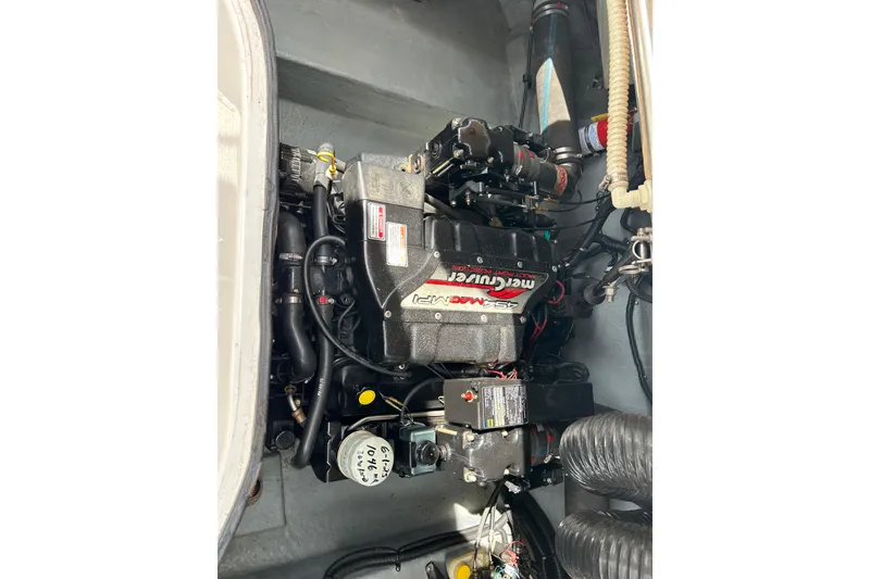Slide: The Image of Engine compartment of a 1998 Sea Ray 280 Bow Rider with MerCruiser engine. - 19