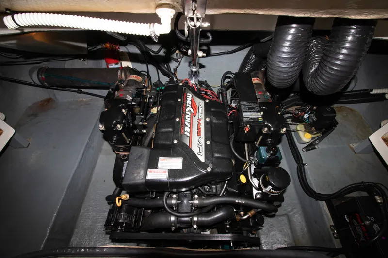 Slide: The Image of Engine compartment of a 1998 Sea Ray 280 Bow Rider boat. - 4