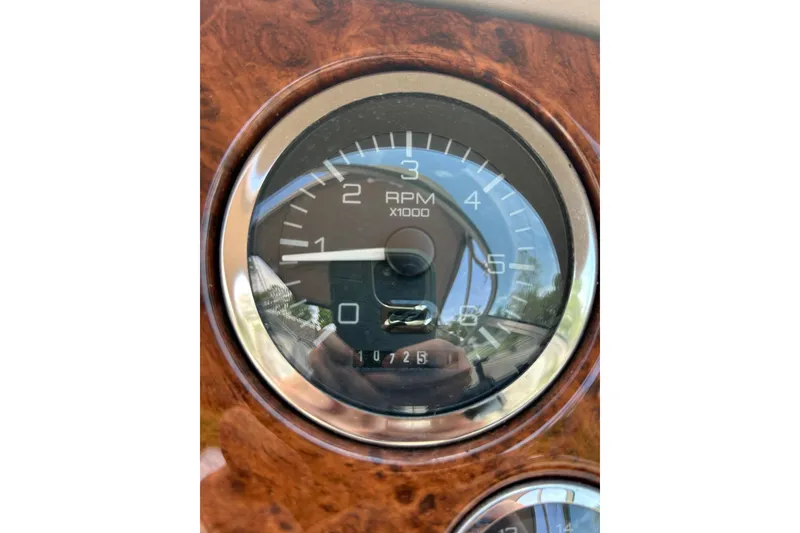 Slide: The Image of Tachometer of 1998 Sea Ray 280 Bow Rider showing RPM and odometer reading. - 72