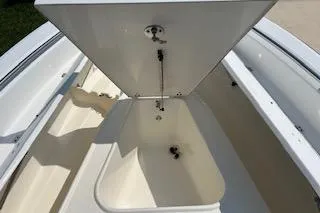 Slide: The Image of Open storage compartment on 2008 Boston Whaler 230 Dauntless boat. - 11