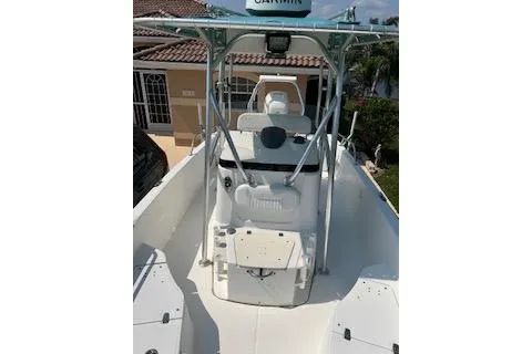 Slide: The Image of 2008 Boston Whaler 230 Dauntless boat with center console and Garmin equipment. - 13