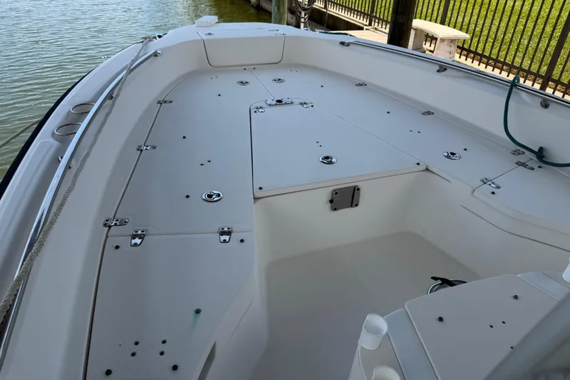 Slide: The Image of 2008 Boston Whaler 230 Dauntless boat deck, spacious and well-equipped for fishing or leisure. - 46