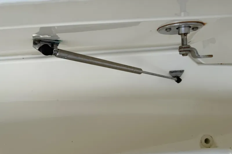 Slide: The Image of Gas strut mechanism on a 2008 Boston Whaler 230 Dauntless boat. - 40