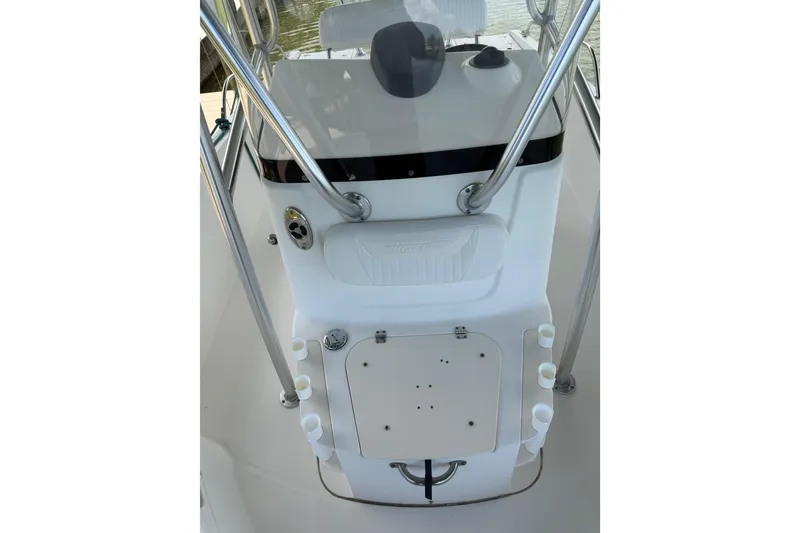 Slide: The Image of Boston Whaler 230 Dauntless 2008 center console with rod holders and steering wheel. - 37