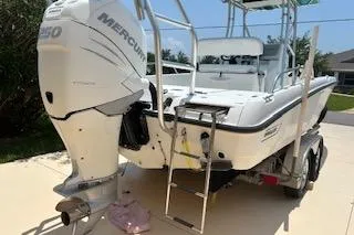 Slide: The Image of 2008 Boston Whaler 230 Dauntless boat with Mercury engine on trailer. - 8