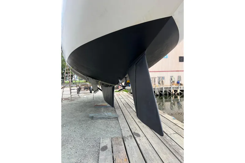 Slide: The Image of 1978 Gulfstar Ketch sailboat hull and rudder on dry dock. - 21