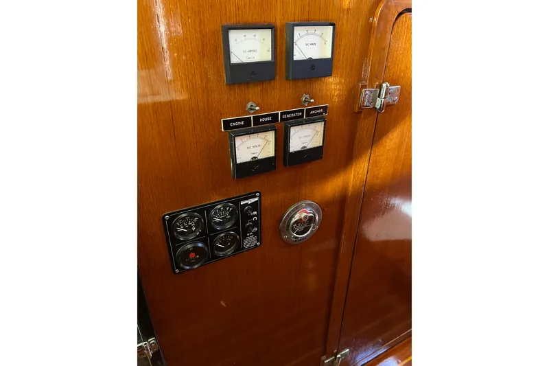 Slide: The Image of Electrical panel on a 1978 Gulfstar Ketch with gauges and meters. - 23
