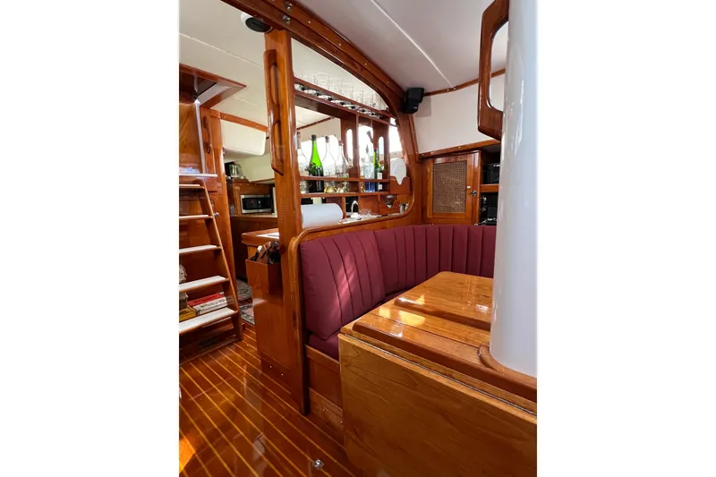 Slide: The Image of Interior of 1978 Gulfstar Ketch with polished wood and cozy seating area. - 35