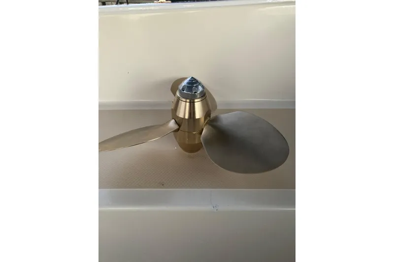 Slide: The Image of Bronze propeller for 1978 Gulfstar Ketch sailboat, displayed on a white surface. - 43