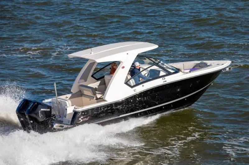 The Image of Manufacturer Provided Image: 2025 Scout 277 Dorado boat cruising on open water. - 0
