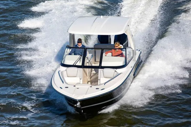 Slide: The Image of Manufacturer Provided Image: 2025 Scout 277 Dorado boat cruising on open water. - 1
