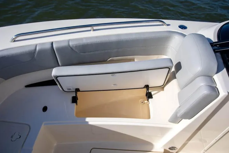 Slide: The Image of Manufacturer Provided Image: 2025 Scout 277 Dorado boat interior with open storage compartment. - 5