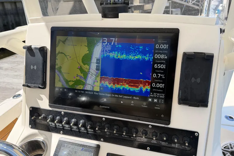 Slide: The Image of Garmin marine navigation display on 2022 Pathfinder 2200 TRS boat dashboard. - 22