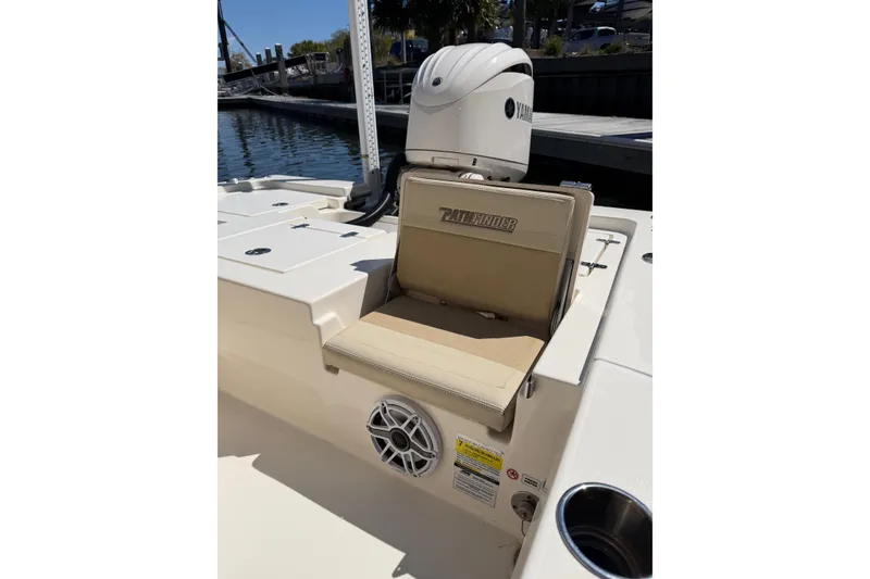 Slide: The Image of 2022 Pathfinder 2200 TRS boat with Yamaha engine, featuring a beige seat and speaker. - 28