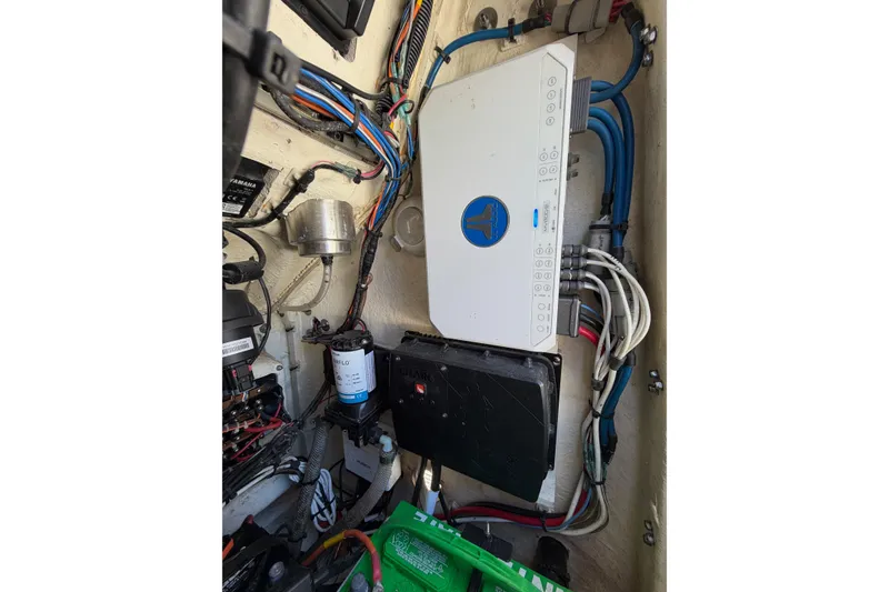 Slide: The Image of Electrical system inside a 2022 Pathfinder 2200 TRS boat, showcasing wiring and components. - 47