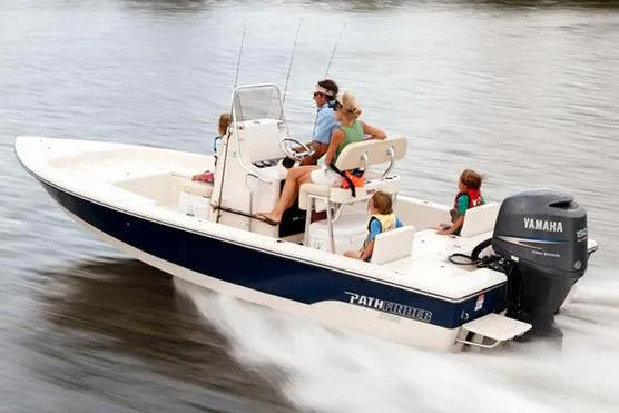 Slide: The Image of Manufacturer Provided Image: 2022 Pathfinder 2200 TRS boat cruising on water with family onboard. - 55